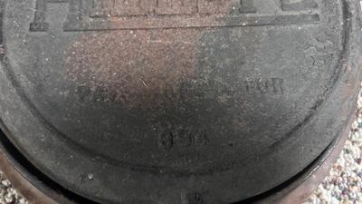 HIBBARD CAST IRON WAFFLE MAKER AND A FUEL JUG TO KEEP THE WAFFLES COOKING