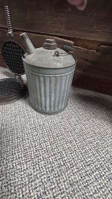 HIBBARD CAST IRON WAFFLE MAKER AND A FUEL JUG TO KEEP THE WAFFLES COOKING