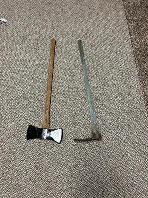DOUBLE BIT AXE AND AN ADZE