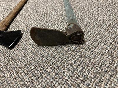 DOUBLE BIT AXE AND AN ADZE