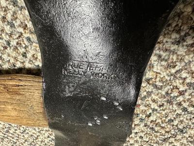 DOUBLE BIT AXE AND AN ADZE