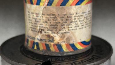 OLD TIN CANS AND BOTTLES