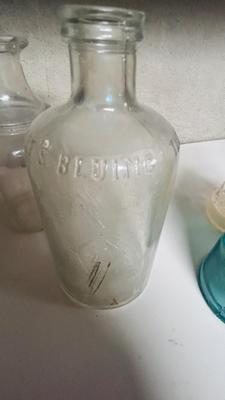 TURQUOISE INSULATORS AND GLASS BOTTLES SAVED FROM THE INCINERATOR