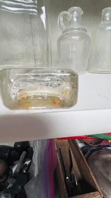 TURQUOISE INSULATORS AND GLASS BOTTLES SAVED FROM THE INCINERATOR