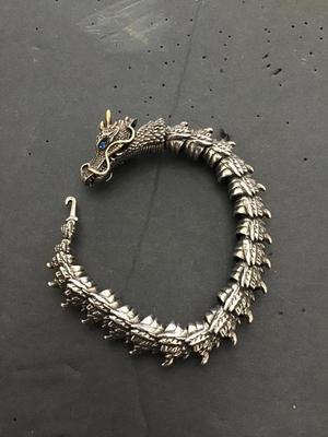 Sale Photo Thumbnail #159: Very nice Silvertone dragon bracelet. Please see attached photos.