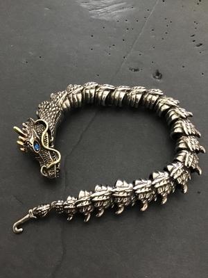 Sale Photo Thumbnail #163: Very nice Silvertone dragon bracelet. Please see attached photos.
