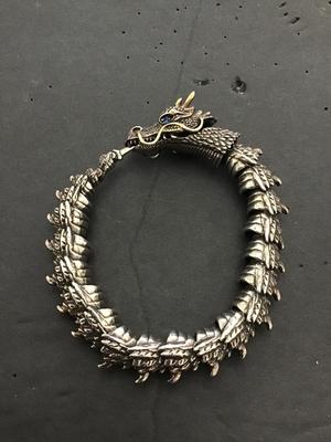 Sale Photo Thumbnail #158: Very nice Silvertone dragon bracelet. Please see attached photos.
