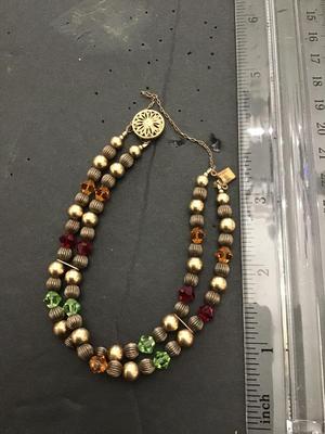 Sale Photo Thumbnail #179: Beautiful multicolored rhinestone bracelet with 14 1/20 Goldfield clasp. Please see attached photos.