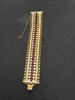 Sale Photo Thumbnail #197: This is a beautiful vintage Hobe bracelet, clear and red rhinestones, gold tone bracelet. Please see attached photos.