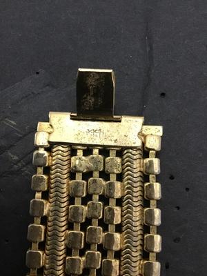 Sale Photo Thumbnail #199: This is a beautiful vintage Hobe bracelet, clear and red rhinestones, gold tone bracelet. Please see attached photos.