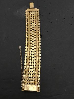 Sale Photo Thumbnail #200: This is a beautiful vintage Hobe bracelet, clear and red rhinestones, gold tone bracelet. Please see attached photos.