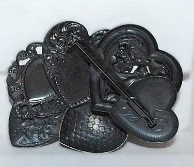 "SIX HEARTS" BROOCH (2¾" x 2") with Various Metal Colors on a Dark Setting