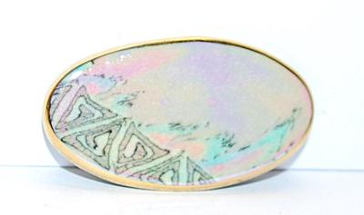 Long OVAL BROOCH (2" x 1") with Pinks & Blues Graphic Design and Gold Colored Edge on a Composite Setting