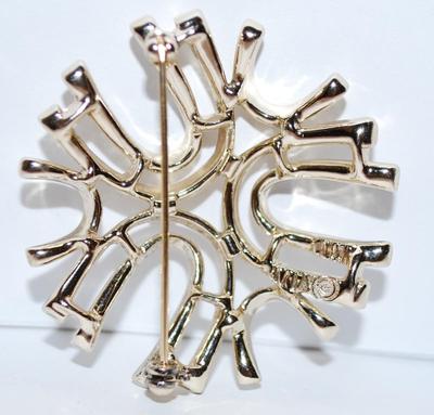 "POINTED STAR" BROOCH (1¾" Diam.) Marked "©SARA" with Silver Tone Setting