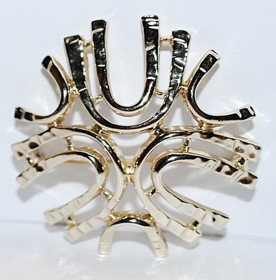 "POINTED STAR" BROOCH (1¾" Diam.) Marked "©SARA" with Silver Tone Setting