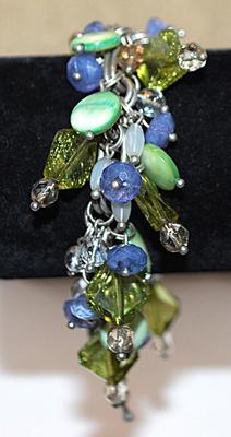 Heavily Beaded BRACELET (2" Opening) with Blues, Greens & Clear Prisms, Ovals and Disk Accents and Lobster Clasp