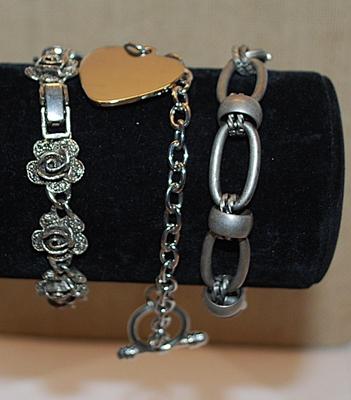 Collection of 3 Silver Colored BRACELETS (2¼"+ Opening) with Silver & Black ROSE FLOWER Accents & 1 Marked...