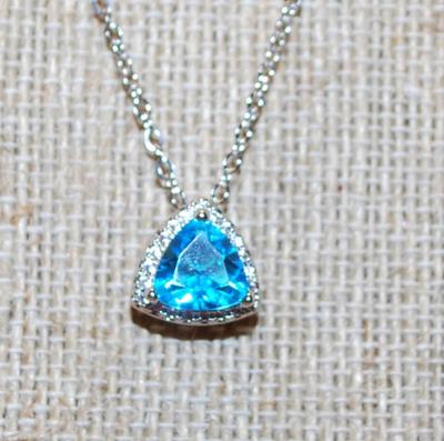 Curved Trillion Cut Blue Stone PENDANT (½" x ½") with Surrounds on a Silver Tone Necklace Chain 17" L