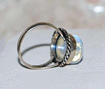 Size 7 Oval Transparent Light Blue OPAL Style Gemstone Ring with Sparkles on a Silver-Plated Band (5.1g)