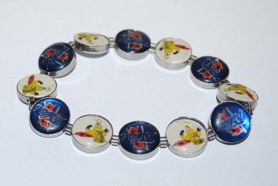 "TULSA" Brand ELASTIC BRACELET (2" Opening) with Colorful Cupped Disks on a Silver Tone Setting