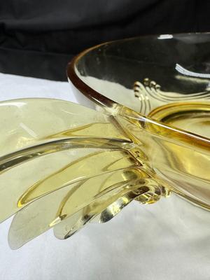 Sale Photo Thumbnail #89: 1930s amber yellow color shows slight signs of use , and has some black crumbs stuck in the edge of one of the wings. I have not cleaned aggressively. Winged plume handles sh0w off this rare topaz color Art Deco piece.