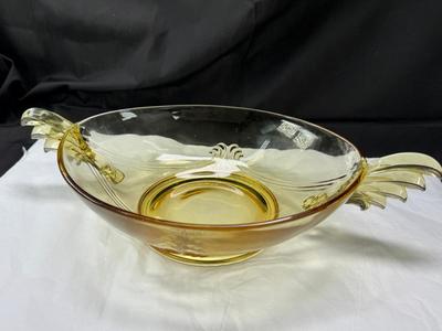 Sale Photo Thumbnail #86: 1930s amber yellow color shows slight signs of use , and has some black crumbs stuck in the edge of one of the wings. I have not cleaned aggressively. Winged plume handles sh0w off this rare topaz color Art Deco piece.