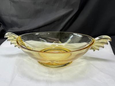 Sale Photo Thumbnail #94: 1930s amber yellow color shows slight signs of use , and has some black crumbs stuck in the edge of one of the wings. I have not cleaned aggressively. Winged plume handles sh0w off this rare topaz color Art Deco piece.