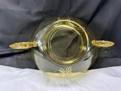 Sale Photo Thumbnail #93: 1930s amber yellow color shows slight signs of use , and has some black crumbs stuck in the edge of one of the wings. I have not cleaned aggressively. Winged plume handles sh0w off this rare topaz color Art Deco piece.