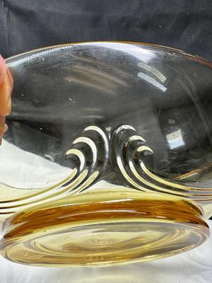 Sale Photo Thumbnail #96: 1930s amber yellow color shows slight signs of use , and has some black crumbs stuck in the edge of one of the wings. I have not cleaned aggressively. Winged plume handles sh0w off this rare topaz color Art Deco piece.