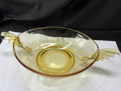 Sale Photo Thumbnail #87: 1930s amber yellow color shows slight signs of use , and has some black crumbs stuck in the edge of one of the wings. I have not cleaned aggressively. Winged plume handles sh0w off this rare topaz color Art Deco piece.