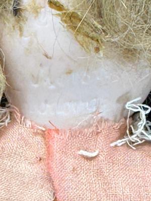 Sale Photo Thumbnail #104: German and French bru Spanish Dancer, plastic doll without her head. madam Alexander book. Porcelain babies, soft ethnic dolls. I found the other boot for the wood chopper. There are 2 music box dolls, and a Raggedy Andy. 2 bells