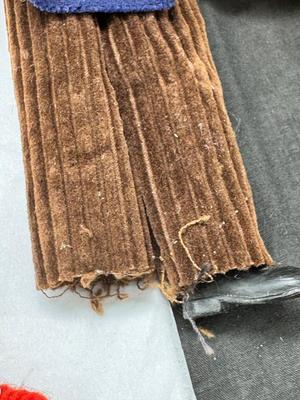 Sale Photo Thumbnail #108: German and French bru Spanish Dancer, plastic doll without her head. madam Alexander book. Porcelain babies, soft ethnic dolls. I found the other boot for the wood chopper. There are 2 music box dolls, and a Raggedy Andy. 2 bells