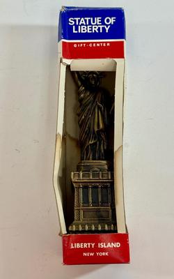 Sale Photo Thumbnail #386: In new condition inside original box. The box has some liquid damage, but the statue is undamaged.