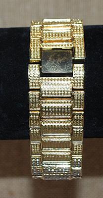 Beautiful Gold Tone JEWEL STUDDED BRACELET (2¼" Opening) with Half Infinity Clear Stone Segments & Overlapping Closure