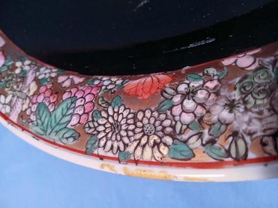 Sale Photo Thumbnail #84: Unmarked. Some wear/tape residue to black glaze. 18 1/4" diam. x 3 1/4" high.