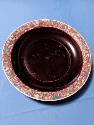 Sale Photo Thumbnail #83: Unmarked. Some wear/tape residue to black glaze. 18 1/4" diam. x 3 1/4" high.