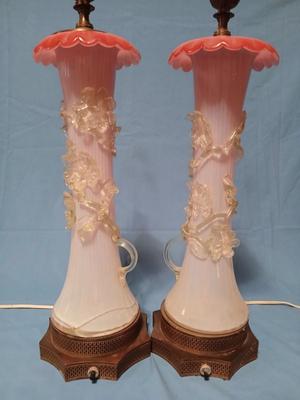 Sale Photo Thumbnail #102: Body of Pink & white opalescent striated ombre effect w/clear pale chartreuse floral vine applied. Bronze metal mounts. Base 6", 13 3/4" high, 27" high incl. shades. One in great condition, the other with crack at base, needing better repair. Shades inclu