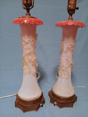 Sale Photo Thumbnail #108: Body of Pink & white opalescent striated ombre effect w/clear pale chartreuse floral vine applied. Bronze metal mounts. Base 6", 13 3/4" high, 27" high incl. shades. One in great condition, the other with crack at base, needing better repair. Shades inclu