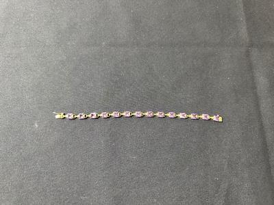.925 STERLING SILVER BRACELET WITH MEDIUM PURPLE STONES