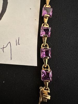 .925 STERLING SILVER BRACELET WITH MEDIUM PURPLE STONES