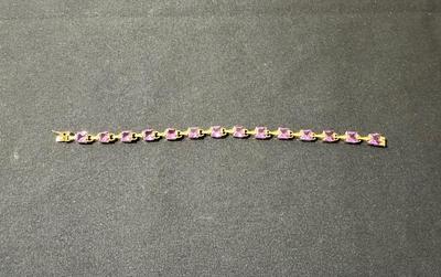 .925 STERLING SILVER BRACELET WITH MEDIUM PURPLE STONES