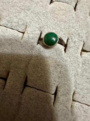 OPAL COLORED STONE RING IS 18K HGE, BEAR CLAW RING, RING WITH DOLPHINS AROUND BAND, AND A RING WITH GREEN STONE