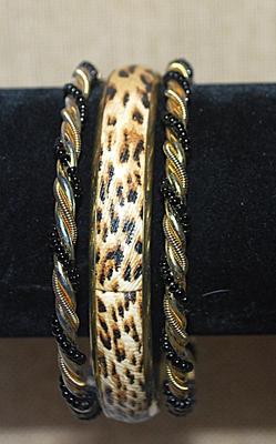 Collection of 3 Black & Gold Colored BRACELETS (2½" Opening) and 1 " Tiger Style"