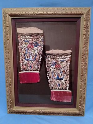 Sale Photo Thumbnail #300: Embroidery includes flowers, leaves, vines, people, animals, birds/peacocks Frame, 19 3/8" x 26", Sleeves approx. 6 1/2" x 13".