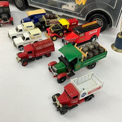 694 Large Lot Of Advertisement Trucks