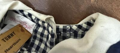 Sale Photo Thumbnail #323: In good condition, but a little discoloration on white collar.