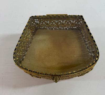 Sale Photo Thumbnail #131: In good condition, except one of the four feet is bent a little.