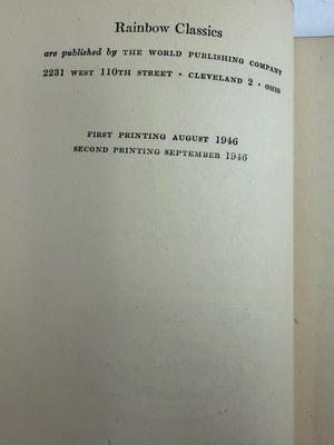 Sale Photo Thumbnail #71: 2nd printing from 1946. Numerous classic illustrations by John Tenniel.  Good condition for a book that is 80 years old.  Story originally published in 1865.