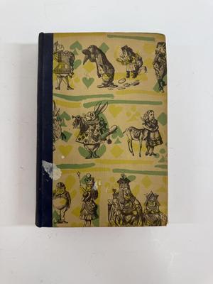Sale Photo Thumbnail #68: 2nd printing from 1946. Numerous classic illustrations by John Tenniel.  Good condition for a book that is 80 years old.  Story originally published in 1865.