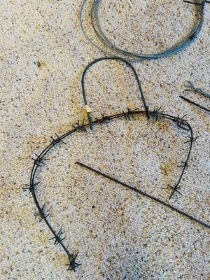AN ASSORTMENT OF BARBED WIRE